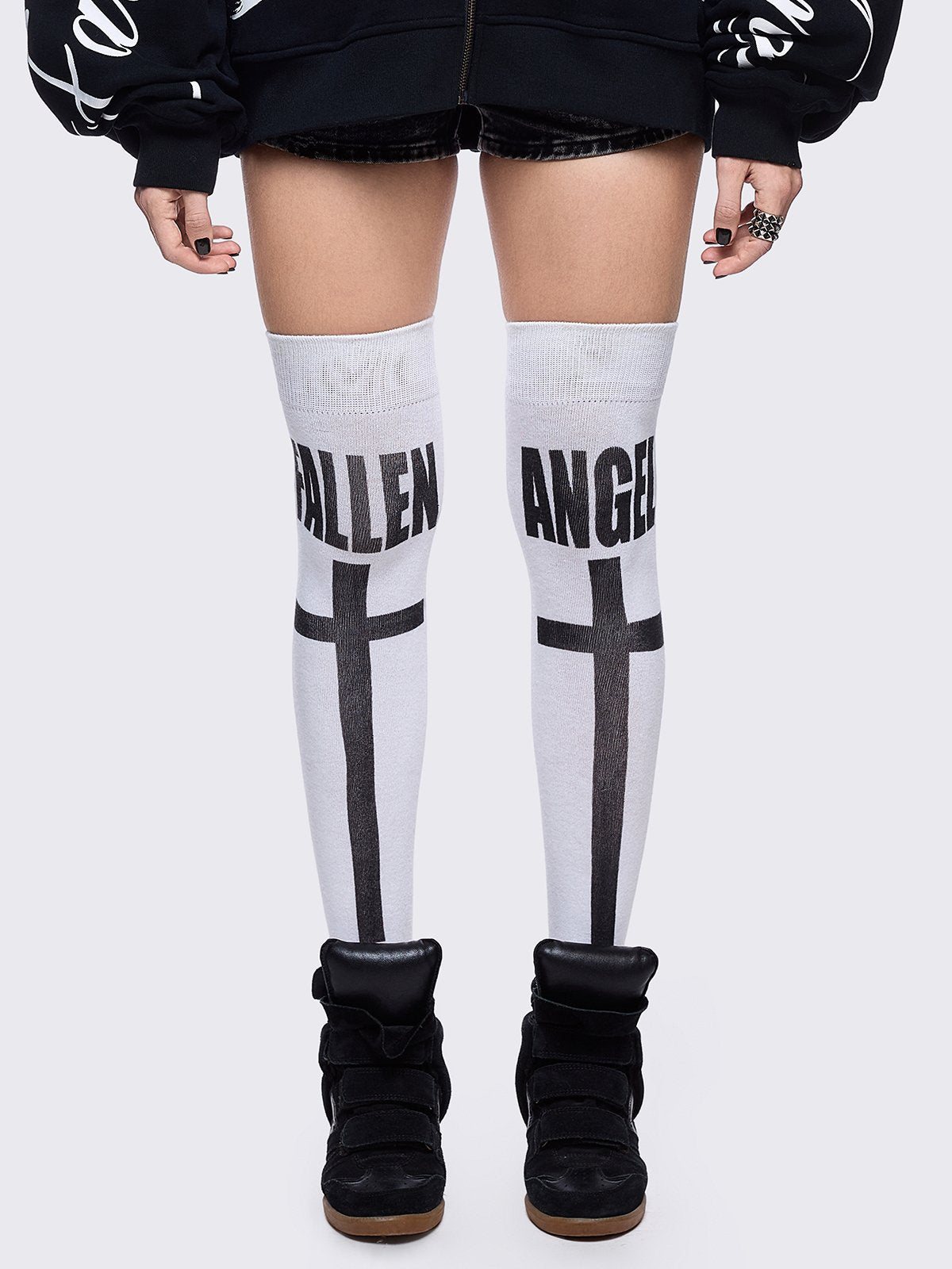 White opaque thigh highs socks with "fallen angel" cross graphic design. 