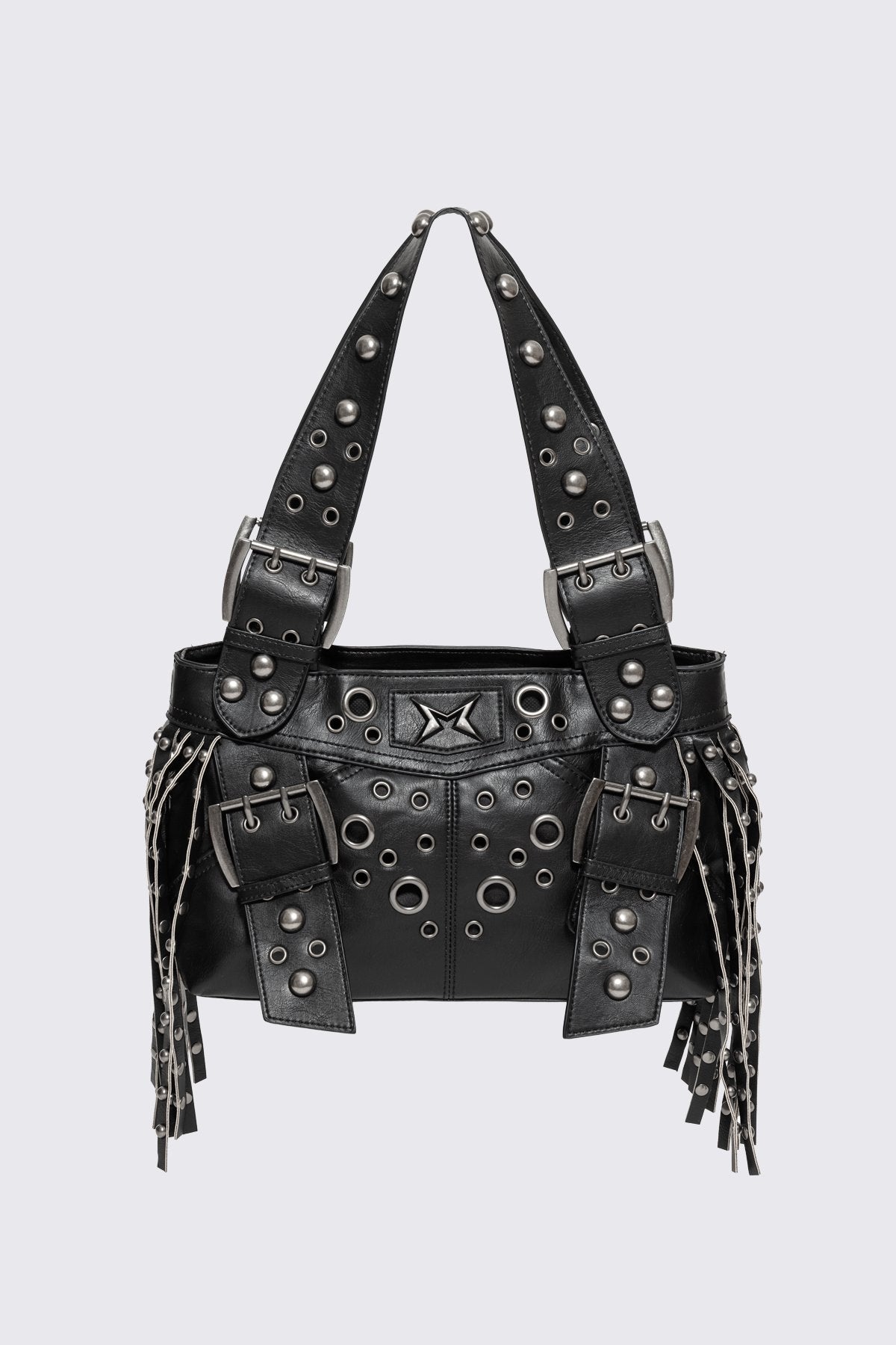Black faux leather shoulder bag with studs, eyelets, buckles and side fringe in a grunge Y2K style.