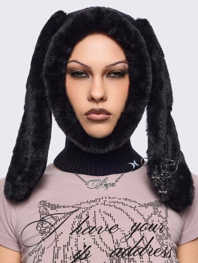 Black knitted balaclava with faux fur floppy ears with chains, safety pins and cross pendants.