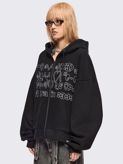Black zip up hoodie jacket featuring a kaomoji ASCII-style embroidery in white.