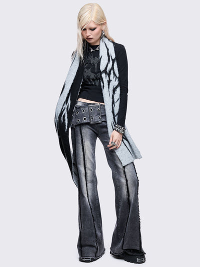 Grey and black reversible fluffy scarf with tribal sigilism design.