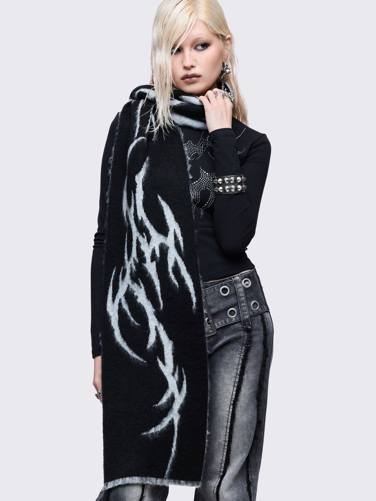 Grey and black reversible fluffy scarf with tribal sigilism design.