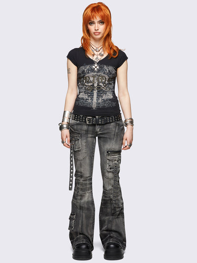 Black graphic v-neck baby tee featuring grunge graphic front print and "Grime" hot fix stud detail.