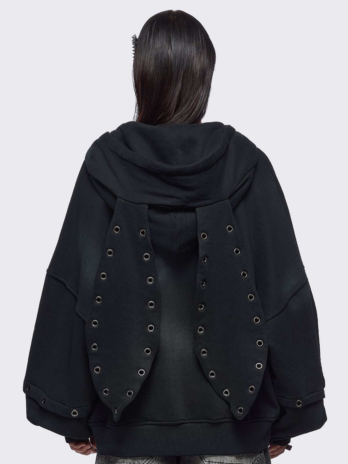 Black washed layered zip up hoodie with floppy ears hood, "Heaven" embroidery and silver eyelet details.