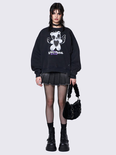Oversized black sweatshirt with a teddy bear graphic front print by @iscreamcolour, featuring side slits and drop shoulders for a relaxed fit.