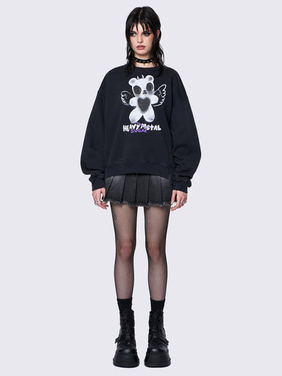 Oversized black sweatshirt with a teddy bear graphic front print by @iscreamcolour, featuring side slits and drop shoulders for a relaxed fit.
