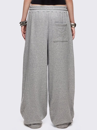 Grey marl wide leg sweatpants with chunky silver eyelets.