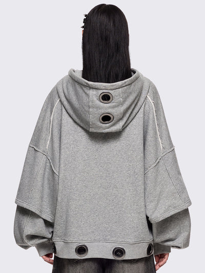 Grey marl layered zip up hoodie featuring chunky silver eyelets and raw edge seam details.