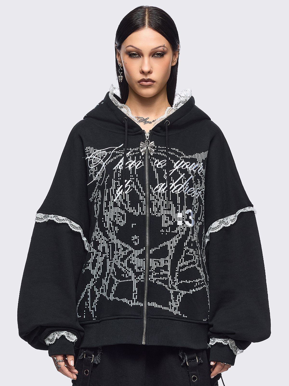 Black oversize zip up hoodie jacket with "I have your IP address" embroidery, anime girl ASCII-style graphic print and white lace seam details.