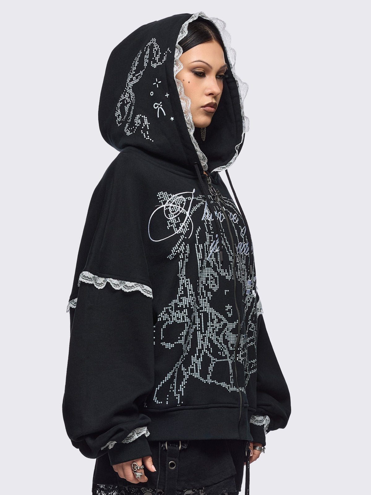 Black oversize zip up hoodie jacket with "I have your IP address" embroidery, anime girl ASCII-style graphic print and white lace seam details.