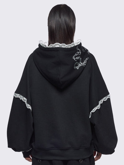 Black oversize zip up hoodie jacket with "I have your IP address" embroidery, anime girl ASCII-style graphic print and white lace seam details.