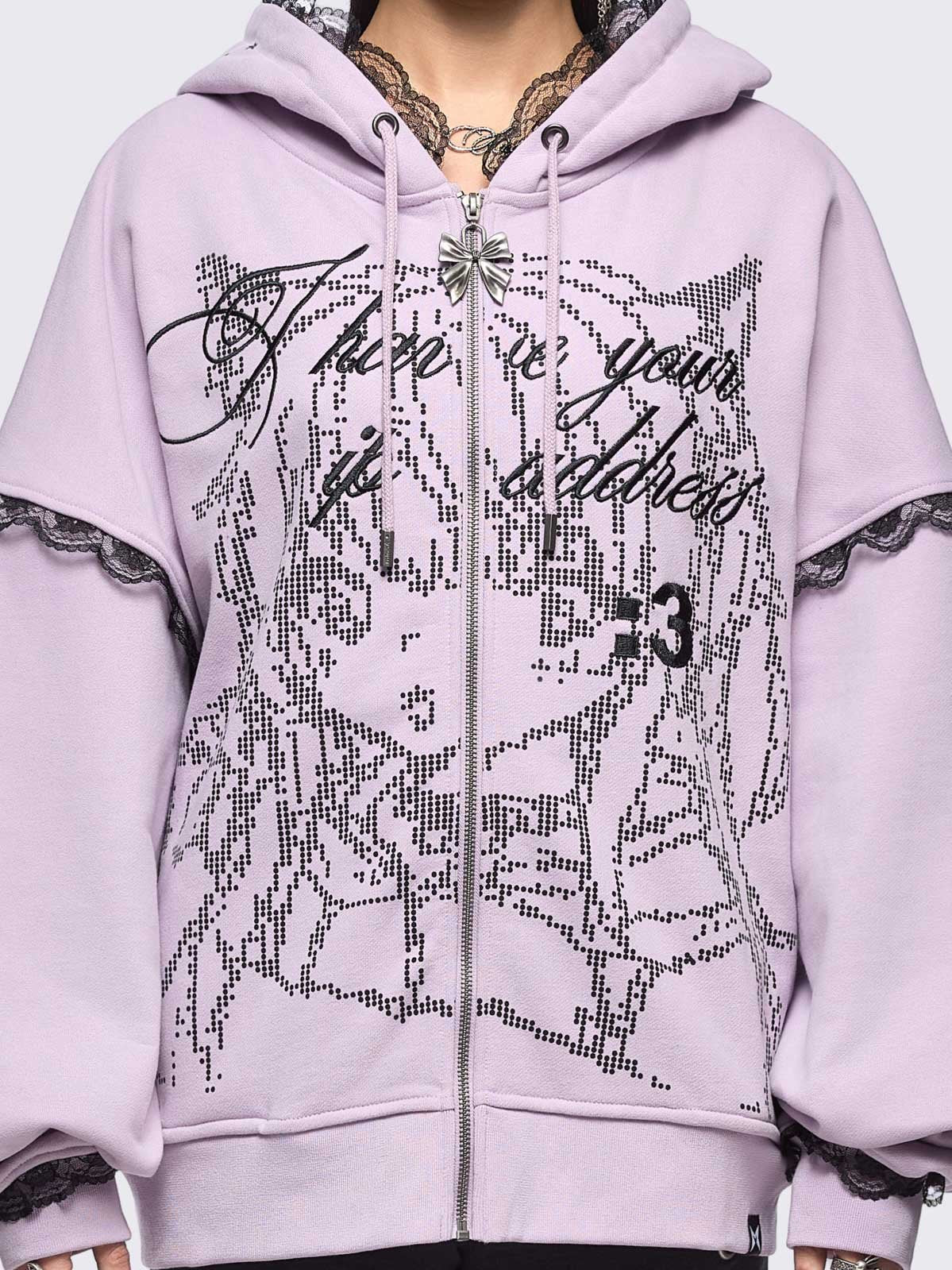 Pink zip up hoodie jacket with "I have your IP address" embroidery, anime girl ASCII-style graphic print and black lace seam details.