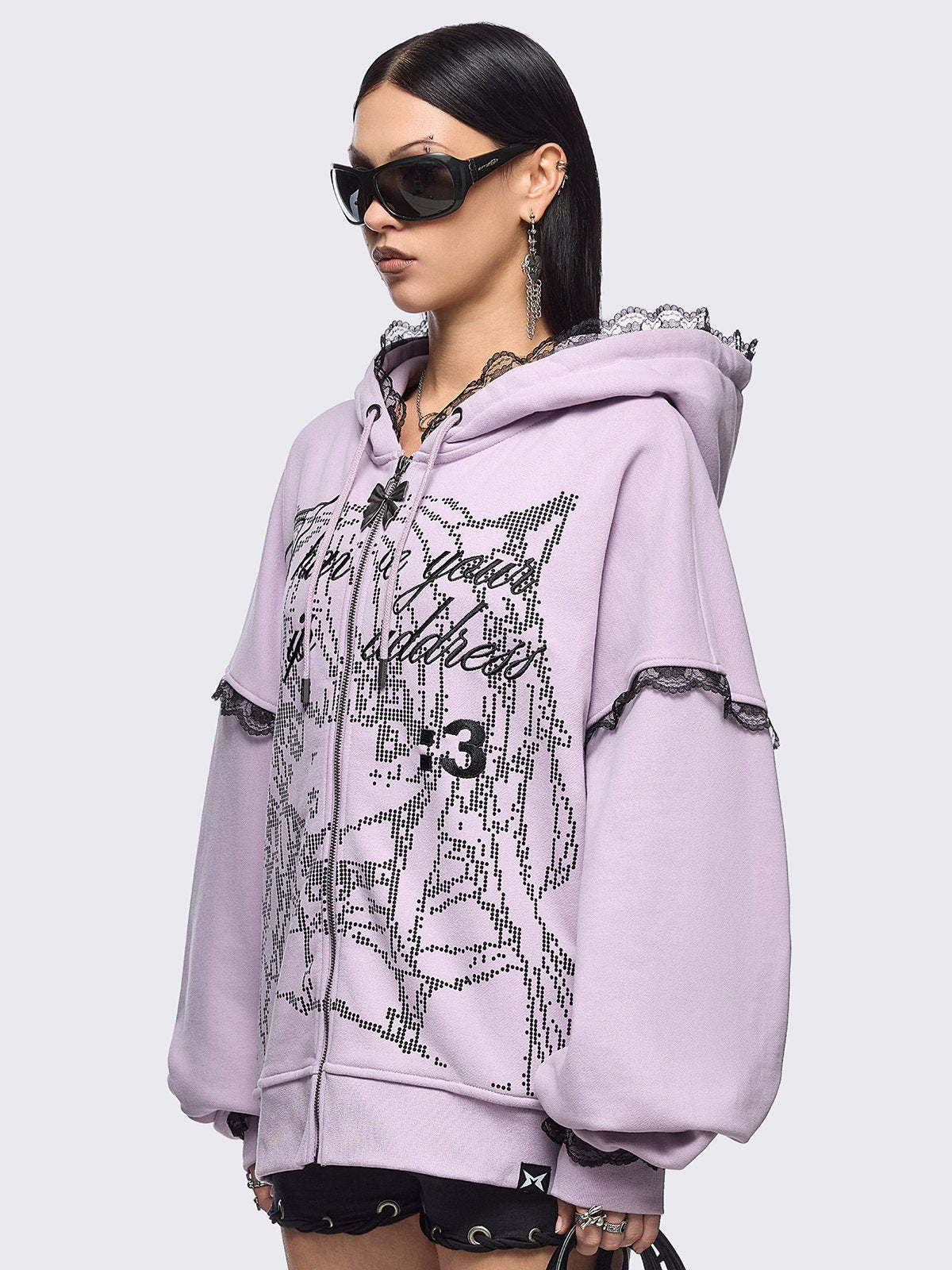 Pink zip up hoodie jacket with "I have your IP address" embroidery, anime girl ASCII-style graphic print and black lace seam details.