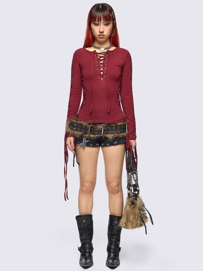 Burgundy long sleeve top with lace-up details.