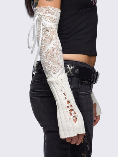 White knit arm warmers with fishnet layer and lace up details.