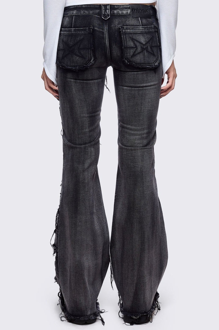 Flared Distressed Jeans with Shredded, Eyelets and Studs | Minga