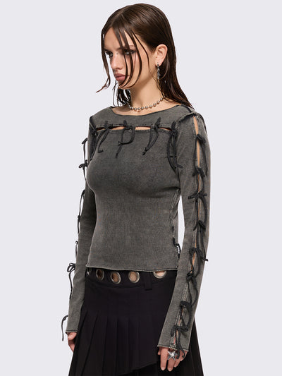 Grey washed rib top with cut-out and bow details.