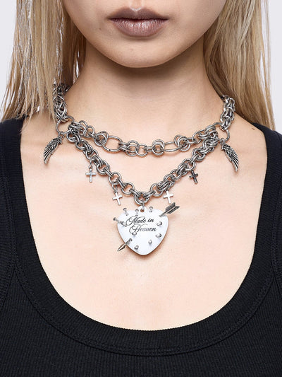 Two-layered silver chain necklace with a gothic aesthetic.