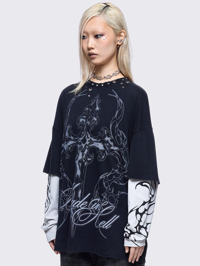 Black washed layered long sleeve t-shirt featuring "Made in hell" and cross graphic print, contrast off-white sleeves with sigilism print and silver eyelet and spike details.