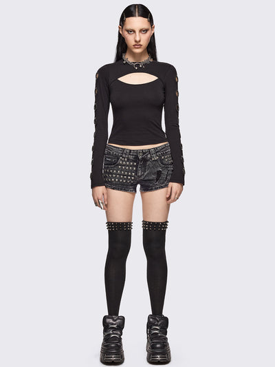 Black cut-out top with chunky silver eyelets.
