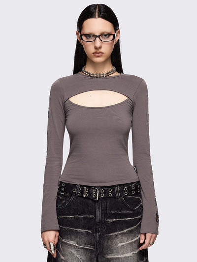 Grey cut-out long sleeve top with chunky silver eyelets on sleeves.
