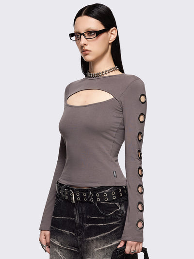 Grey cut-out long sleeve top with chunky silver eyelets on sleeves.