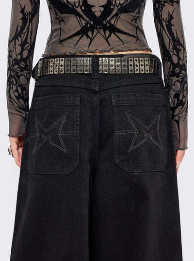 Black vegan leather buckle belt with silver studs in star design. 