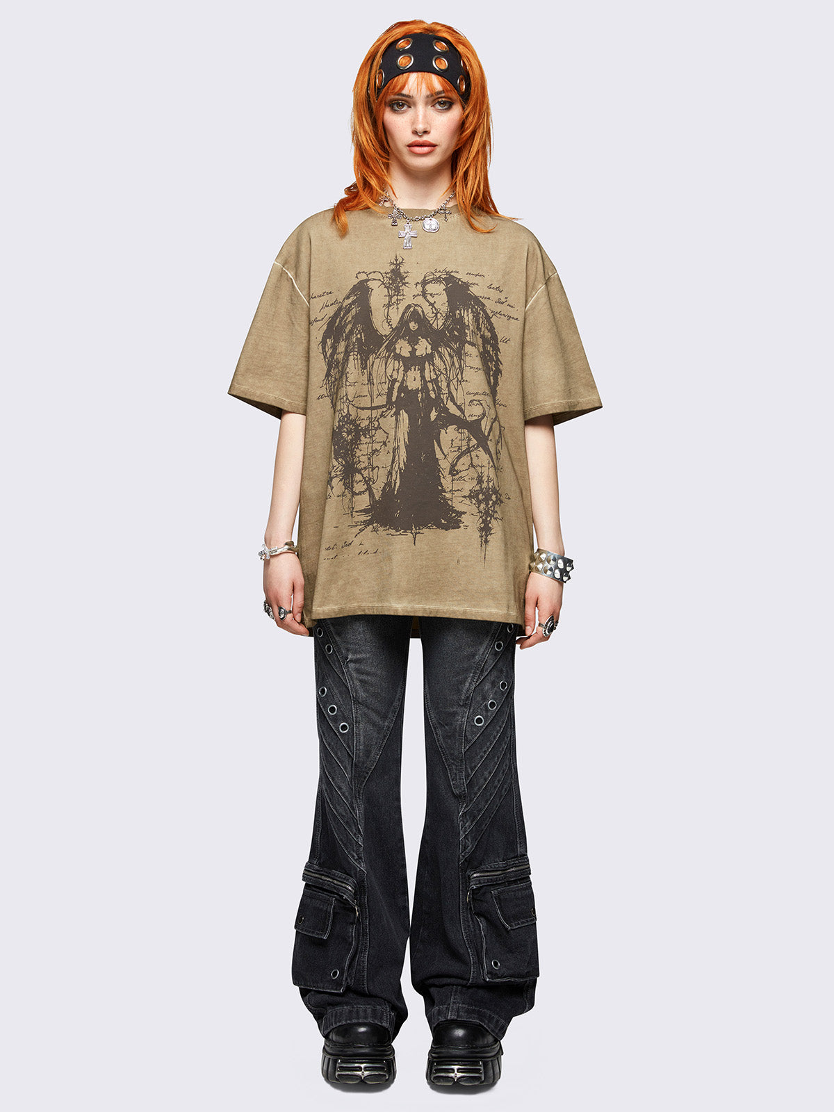 Brown washed oversized t-shirt featuring dark angel graphic front print.