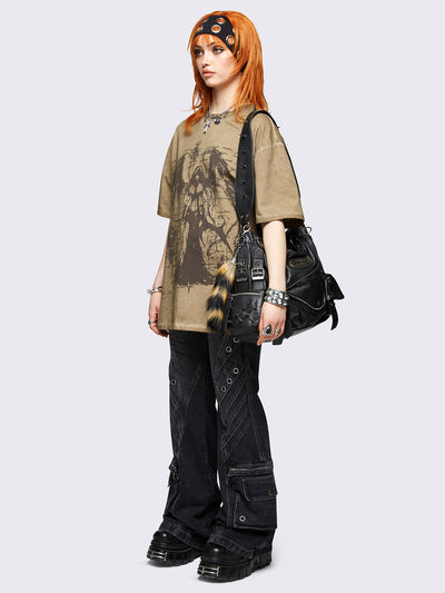 Brown washed oversized t-shirt featuring dark angel graphic front print.