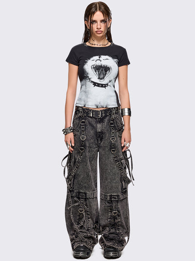 Black graphic baby tee with goth cat graphic print and piercing O-ring details on neckline.