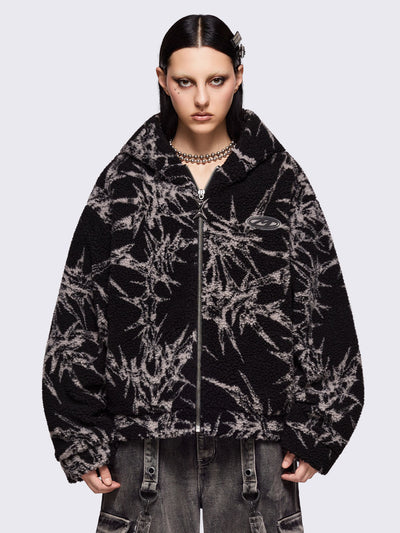 Black fleece borg hoodie jacket featuring all over grey thorns design.