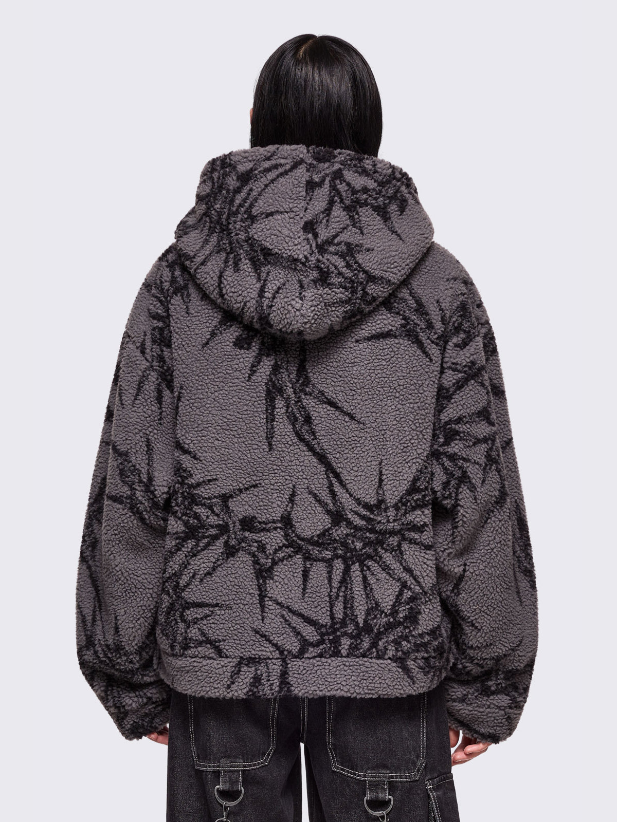 Grey fleece borg hoodie jacket featuring all over black thorns design.