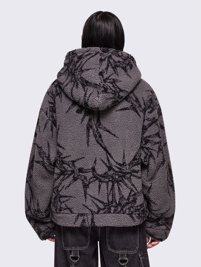 Grey fleece borg hoodie jacket featuring all over black thorns design.