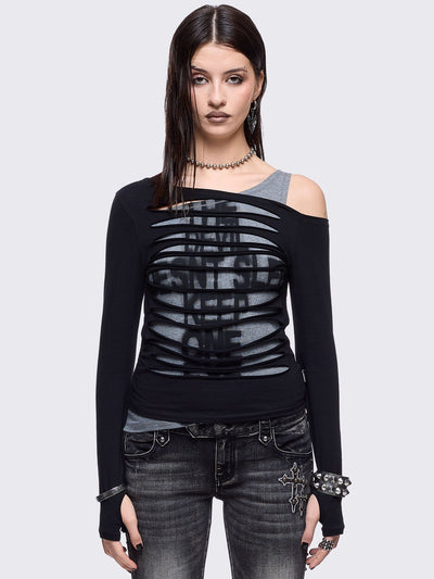 Black and grey long sleeve layered cold shoulder top featuring a front cut-out slash details and a grunge graphic print. 