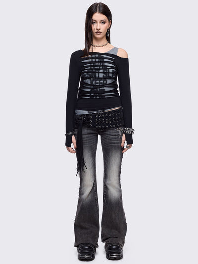 Black and grey long sleeve layered cold shoulder top featuring a front cut-out slash details and a grunge graphic print. 
