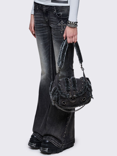 Black vegan shoulder bag with black and grey faux frosted fur and silver stud and hardware details 