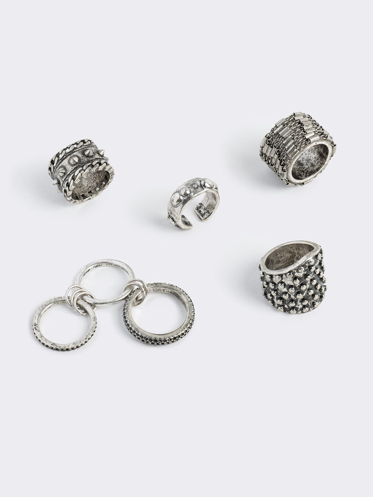 Set of 5 silver chunky rings.