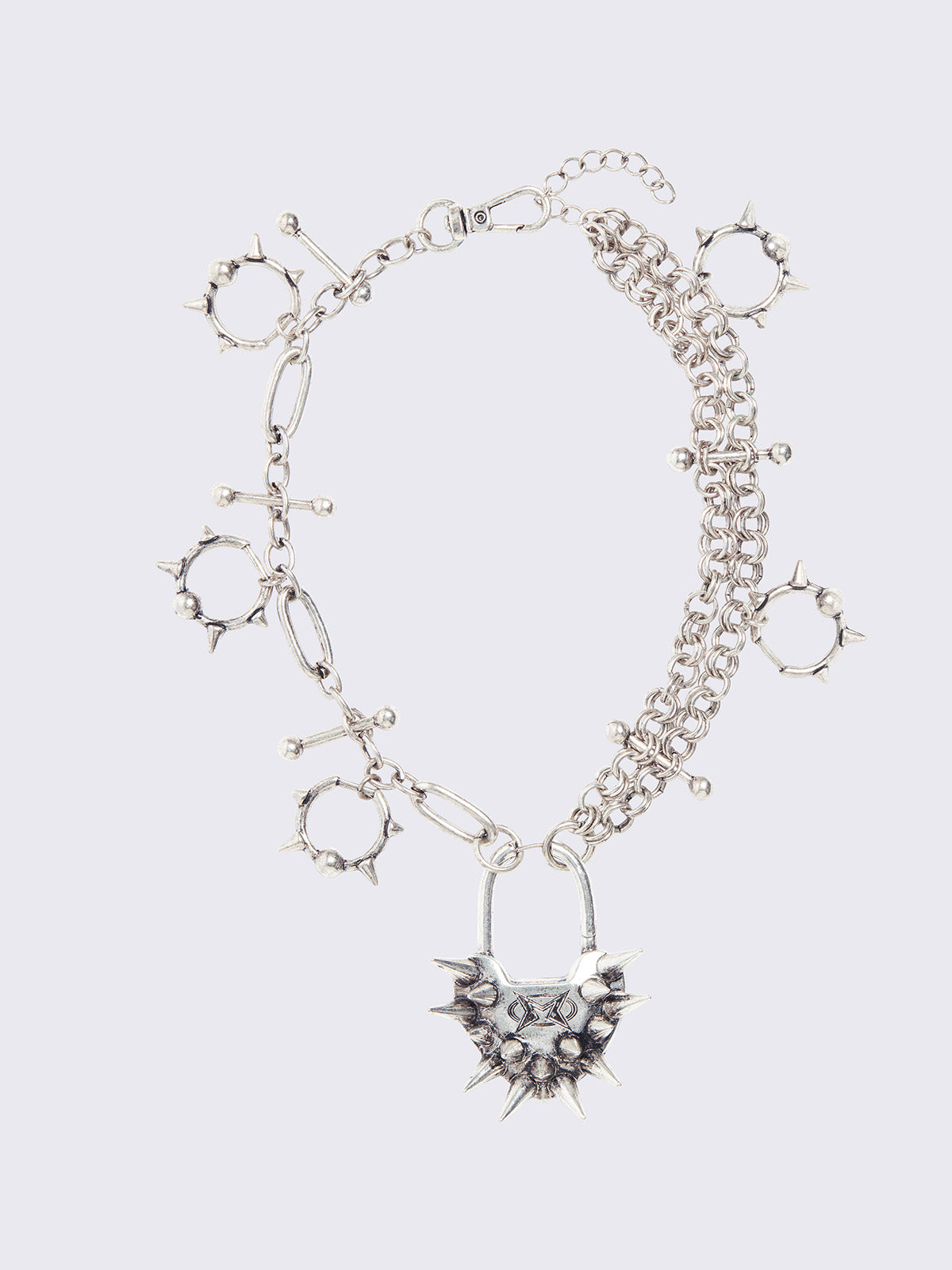 Chunky charm necklace with Spiked heart lock pendant and bold metal piercings details. 