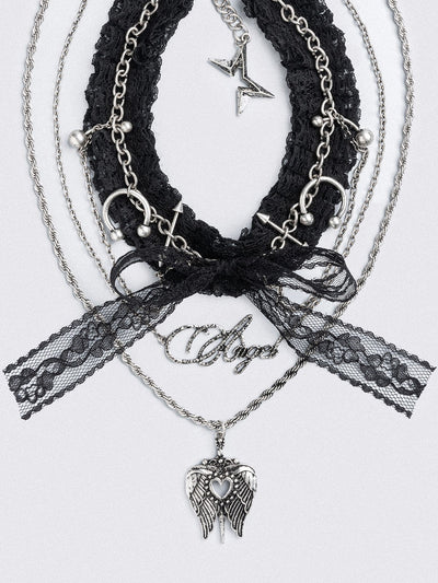 Set of 3 necklaces, black lace bow choker with piercings and chain  and "Angel" tag and winged heart pendants.