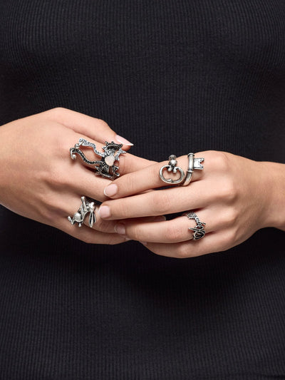 Set of 4 silver rings: Bunny, "angel", heart bow and key designs.