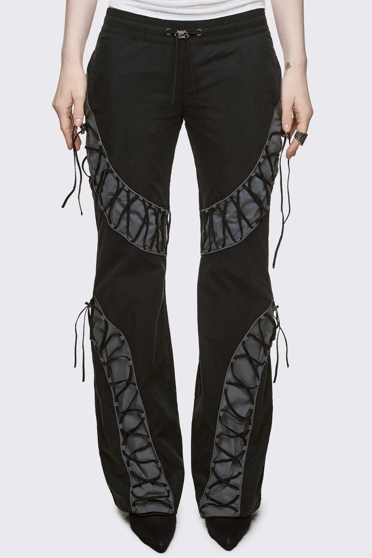 Black parachute baggy flared pants with grey panels with lace up. 