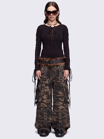 Camo multi pocket cargo jeans featuring a detachable-leg with zipper and all over straps and D-rings details.