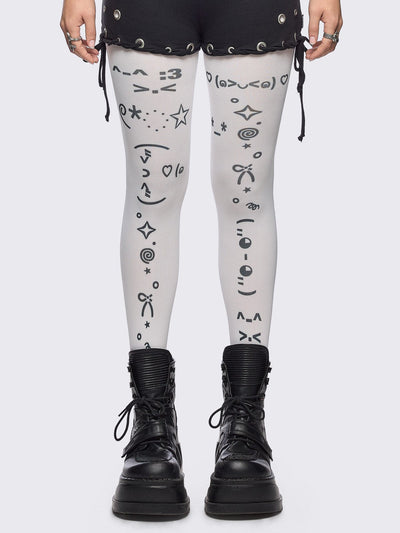 White opaque tights with kaomoji ASCII-style print.