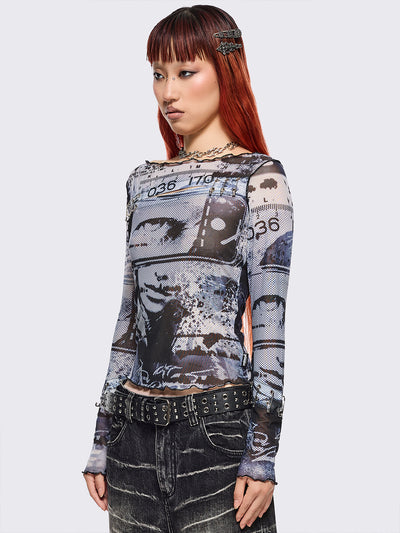 Black and grey graphic mesh crop top with cut-out and safety pins.