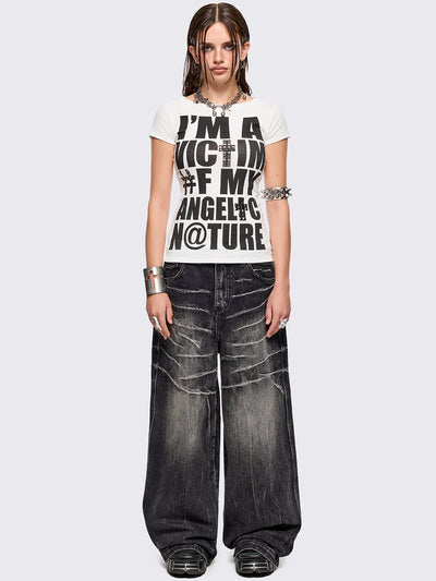 Black washed baggy jeans with grey overdye and distressed wrinkle-effect.