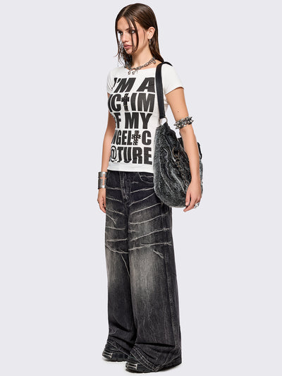 Black washed baggy jeans with grey overdye and distressed wrinkle-effect.