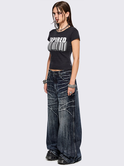 Blue washed wide leg baggy jeans featuring a grey overdye and distressed wrinkle-effect.