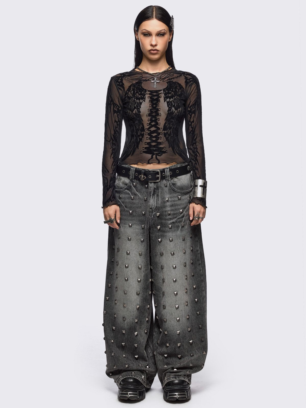 Black mesh top with winged corset and sigilism graphic print.