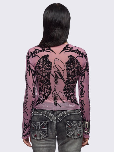 Pink mesh top with black winged corset and sigilism graphic print.