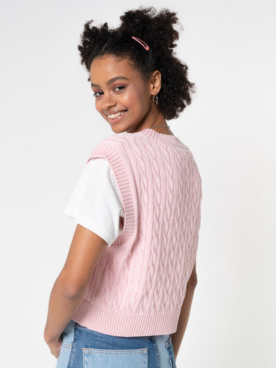 Cable knitted sweater vest in pink with heart embroidery detail